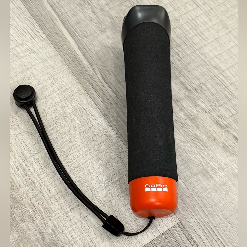 GoPro Black and Orange Camera Grip